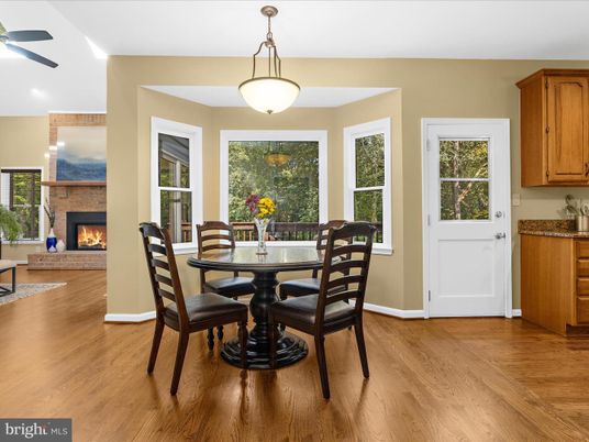 Dining room, Fireplace, Interior, Pendant Lights, Recessed Lighting, Wood Texture Flooring