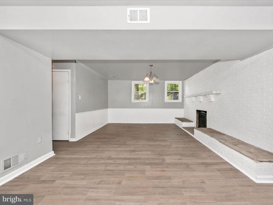 Empty room, Fireplace, Interior, Pendant Lights, Wood Texture Flooring