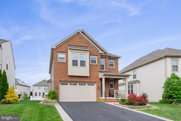 Attached, Exterior, Facade, Brick Facade, Brick Traditional