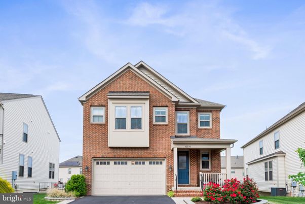 Attached, Exterior, Facade, Brick Facade, Brick Traditional