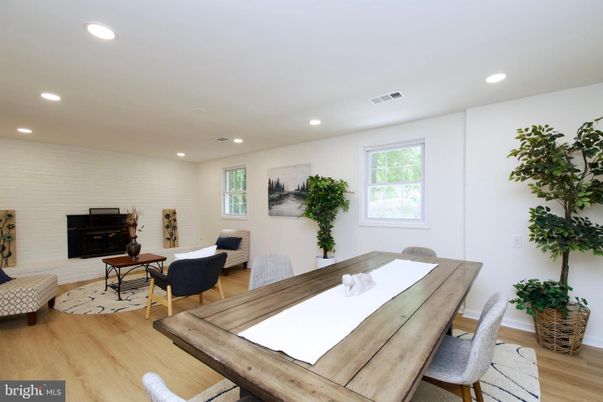 Dining room, Fireplace, Interior, Living room, Recessed Lighting, Wood Texture Flooring