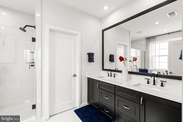 Bathroom, Dual Sink Vanities, Glass Shower, Interior, Marble Walls, Recessed Lighting