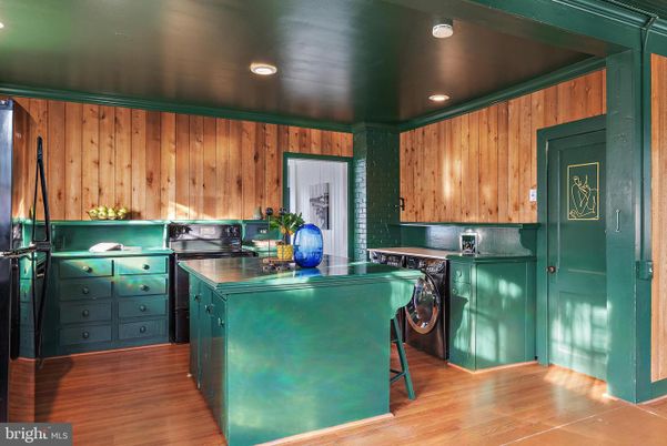 Interior, Kitchen, Recessed Lighting, Washer, Wood Texture Flooring