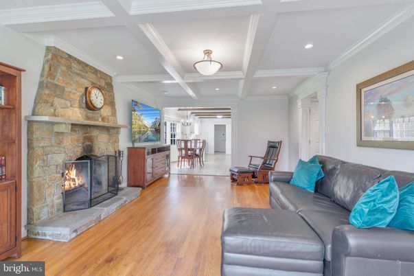 Chandelier, Dining room, Fireplace, Interior, Living room, Recessed Lighting, Stone Walls, Wood Texture Flooring