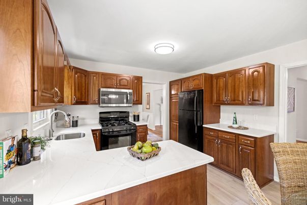 Interior, Kitchen, Tile Countertops, Wood Texture Flooring