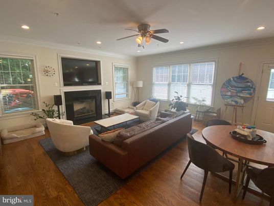 Dining room, Fireplace, Interior, Living room, Recessed Lighting, Wood Texture Flooring