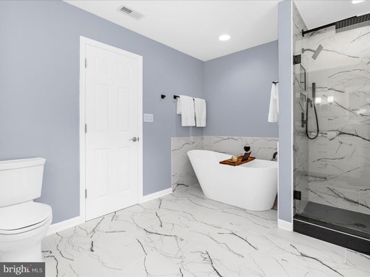 Bathroom, Free Standing Baths, Glass Shower, Interior, Marble, Marble Walls, Recessed Lighting