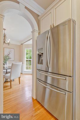 Chandelier, Dining room, Interior, Kitchen, Stainless Steel Appliances, Wood Texture Flooring