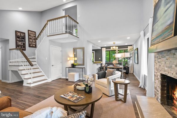 Chandelier, Dining room, Fireplace, Interior, Living room, Recessed Lighting, Stone Walls, Wood Texture Flooring