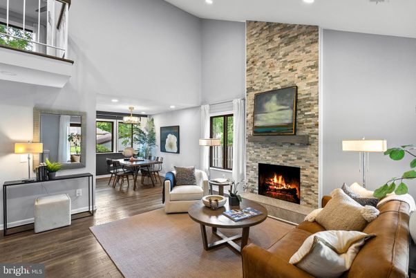 Dining room, Fireplace, Interior, Living room, Pendant Lights, Recessed Lighting, Stone Walls, Wood Texture Flooring