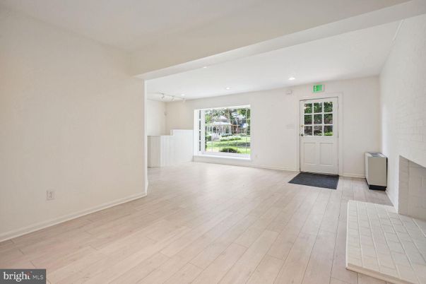 Empty room, Fireplace, Interior, Pendant Lights, Recessed Lighting, Wood Texture Flooring
