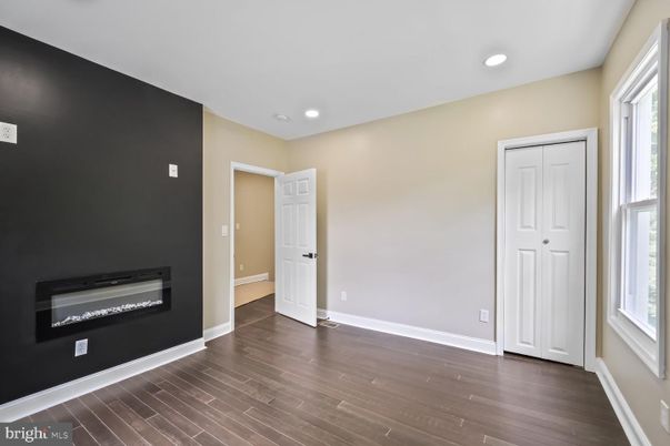 Empty room, Fireplace, Interior, Recessed Lighting, Wood Texture Flooring