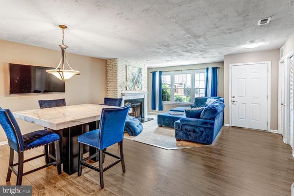 Dining room, Fireplace, Interior, Living room, Pendant Lights, Wood Texture Flooring