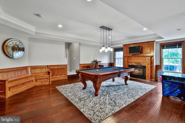 Billiard Table, Fireplace, Game Room, Interior, Pendant Lights, Recessed Lighting, Wood Texture Flooring