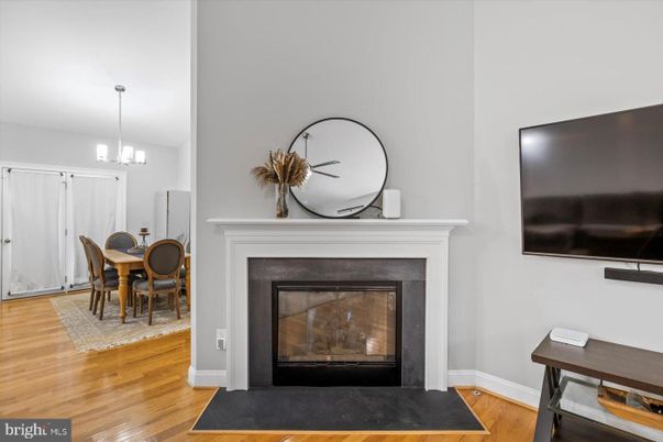 Dining room, Fireplace, Interior, Pendant Lights, Wood Texture Flooring