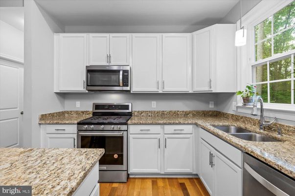 Interior, Kitchen, Pendant Lights, Stainless Steel Appliances, Wood Texture Flooring