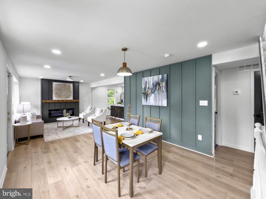 Dining room, Fireplace, Interior, Living room, Pendant Lights, Recessed Lighting, Wood Texture Flooring