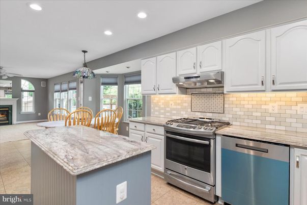 Fireplace, Interior, Kitchen, Pendant Lights, Recessed Lighting, Stainless Steel Appliances