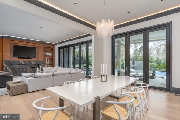 Chandelier, Dining room, Fireplace, Interior, Living room, Recessed Lighting, Wood Texture Flooring, Wooden Walls