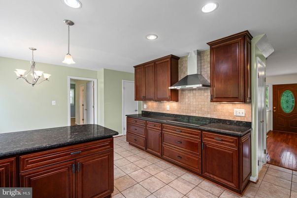 Chandelier, Interior, Kitchen, Pendant Lights, Recessed Lighting, Stainless Steel Appliances, Wood Texture Flooring