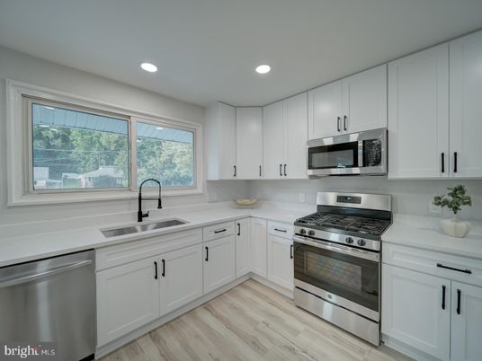 Interior, Kitchen, Recessed Lighting, Stainless Steel Appliances, Wood Texture Flooring