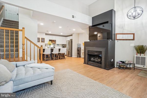 Fireplace, Interior, Kitchen, Pendant Lights, Recessed Lighting, Stainless Steel Appliances, Wood Texture Flooring