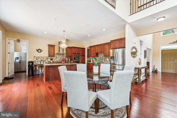Chandelier, Dining room, Interior, Kitchen, Recessed Lighting, Stainless Steel Appliances, Wood Texture Flooring