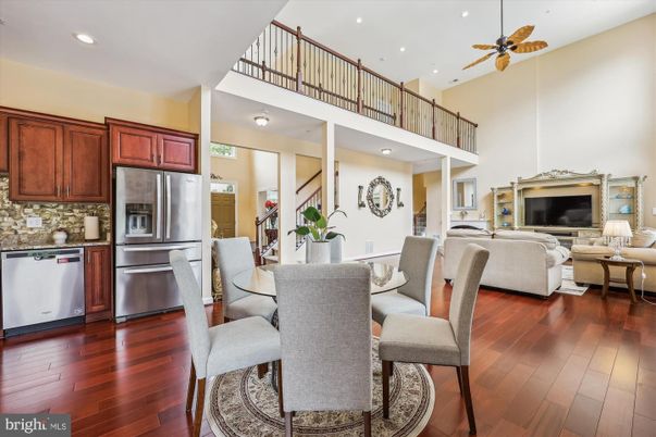 Dining room, Interior, Kitchen, Living room, Recessed Lighting, Stainless Steel Appliances, Wood Texture Flooring