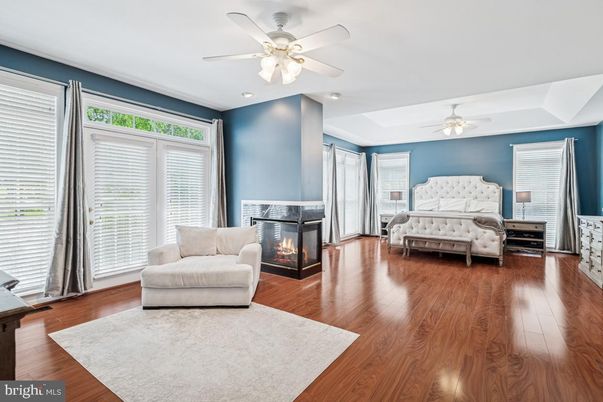 Bedroom, Fireplace, Interior, Recessed Lighting, Wood Texture Flooring