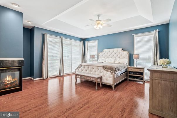 Bedroom, Fireplace, Interior, Recessed Lighting, Wood Texture Flooring