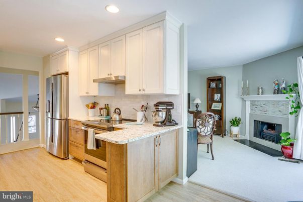 Fireplace, Interior, Kitchen, Recessed Lighting, Wood Texture Flooring