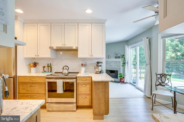 Fireplace, Interior, Kitchen, Recessed Lighting, Wood Texture Flooring