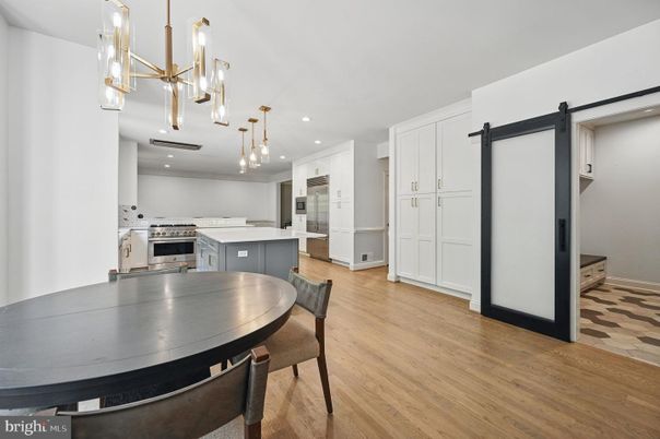 Dining room, Interior, Kitchen, Pendant Lights, Recessed Lighting, Stainless Steel Appliances, Wood Texture Flooring