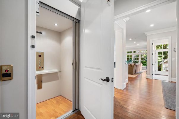 Elevator, Interior, Recessed Lighting, Wood Texture Flooring
