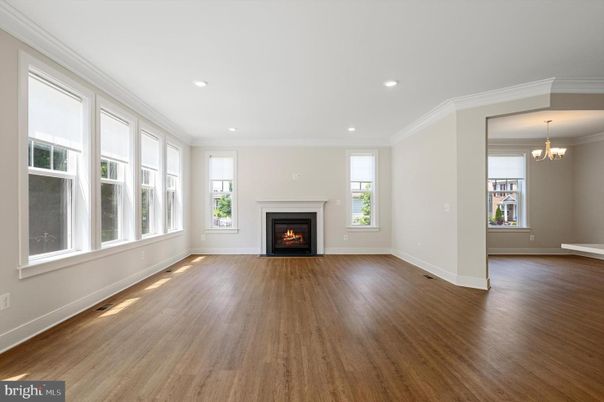 Chandelier, Empty room, Fireplace, Interior, Recessed Lighting, Wood Texture Flooring