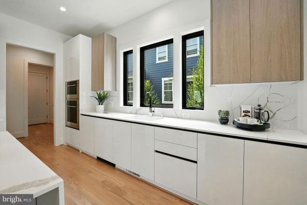 Interior, Kitchen, Marble Walls, Recessed Lighting, Wood Texture Flooring