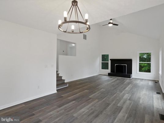 Chandelier, Empty room, Fireplace, Interior, Pendant Lights, Wood Texture Flooring