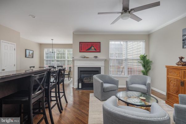 Dining room, Fireplace, Interior, Living room, Pendant Lights, Wood Texture Flooring