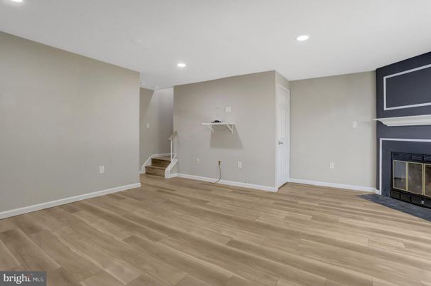 Empty room, Fireplace, Interior, Recessed Lighting, Wood Texture Flooring