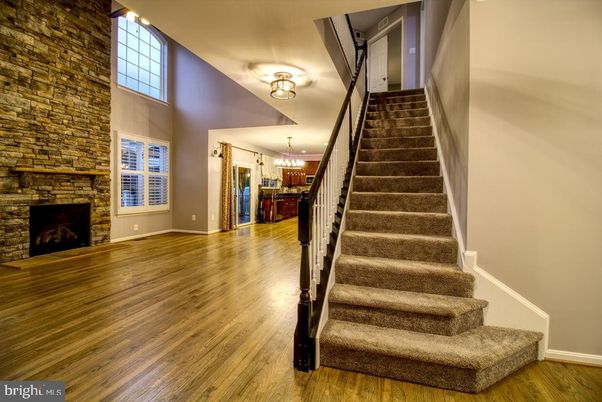 Chandelier, Fireplace, Interior, Stone Walls, Wood Texture Flooring