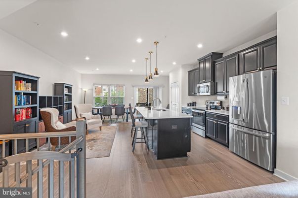 Dining room, Interior, Kitchen, Living room, Pendant Lights, Recessed Lighting, Stainless Steel Appliances, Wood Texture Flooring