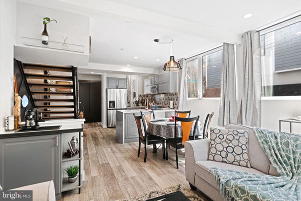 Dining room, Interior, Kitchen, Pendant Lights, Recessed Lighting, Stainless Steel Appliances, Wood Texture Flooring