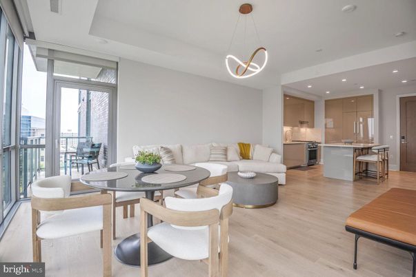 Dining room, Interior, Kitchen, Living room, Pendant Lights, Recessed Lighting, Stainless Steel Appliances, Wood Texture Flooring