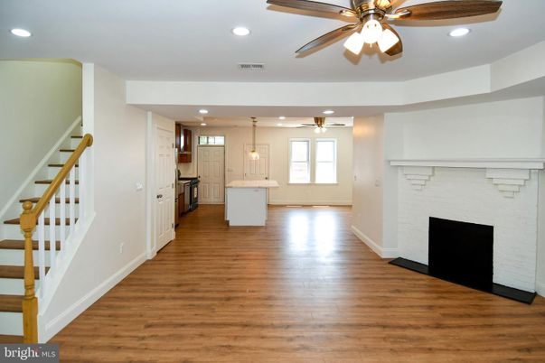 Fireplace, Interior, Kitchen, Pendant Lights, Recessed Lighting, Wood Texture Flooring