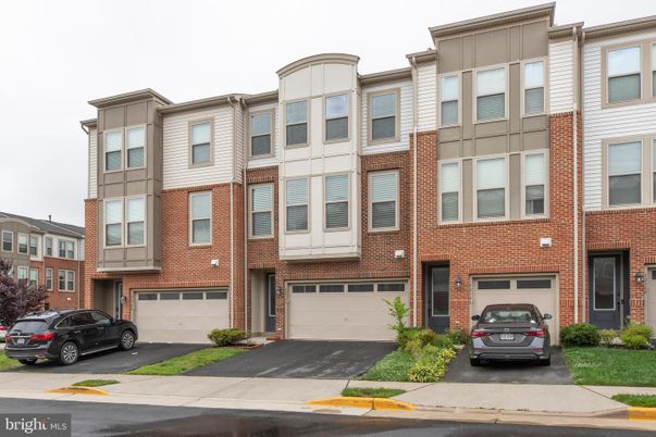 Attached, Exterior, Facade, Brick Facade, Rowhouse