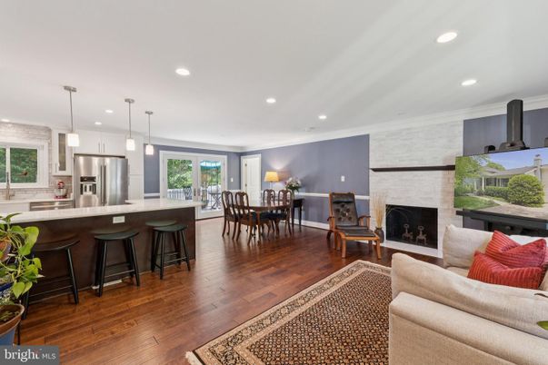 Dining room, Fireplace, Interior, Kitchen, Living room, Pendant Lights, Recessed Lighting, Stainless Steel Appliances, Wood Texture Flooring