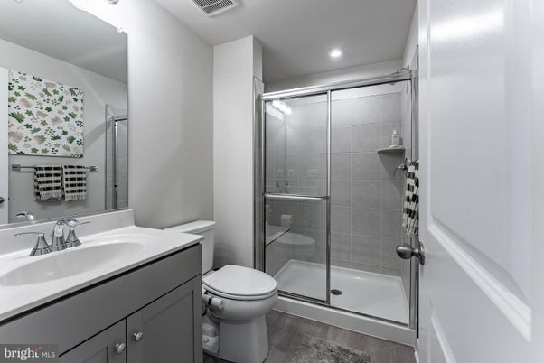 Bathroom, Glass Shower, Interior, Recessed Lighting, Wood Texture Flooring