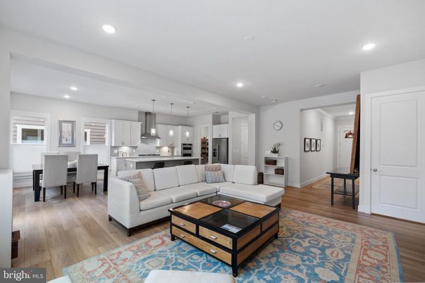 Dining room, Interior, Kitchen, Living room, Pendant Lights, Recessed Lighting, Stainless Steel Appliances, Wood Texture Flooring