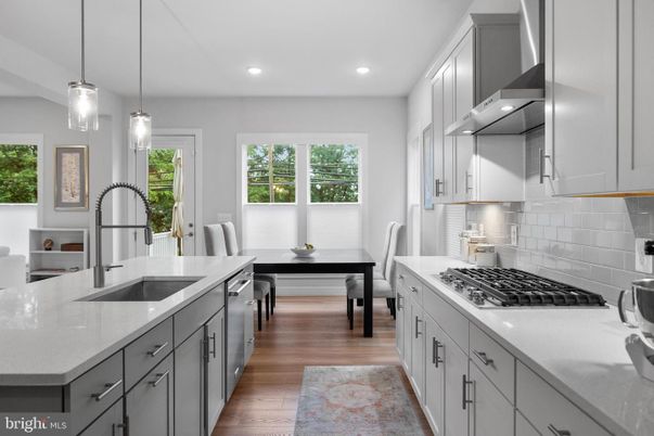 Dining room, Interior, Kitchen, Pendant Lights, Recessed Lighting, Stainless Steel Appliances, Wood Texture Flooring