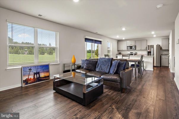 Dining room, Interior, Kitchen, Living room, Recessed Lighting, Stainless Steel Appliances, Wood Texture Flooring